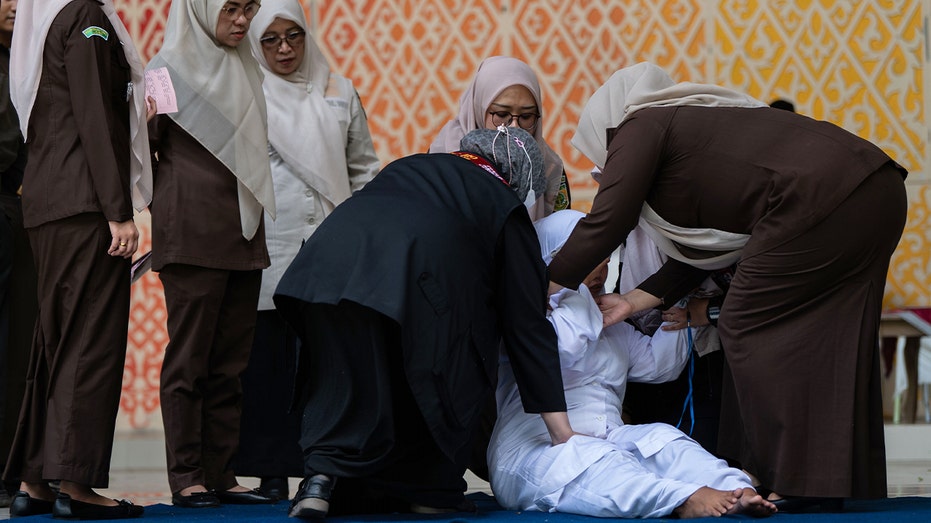 couple-publicly-caned-after-alleged-tiktok-kiss-sparks-outrage-in-indonesia