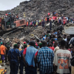 massive-garbage-heap-collapses-onto-homes,-killing-at-least-30-as-rescuers-search-for-survivors